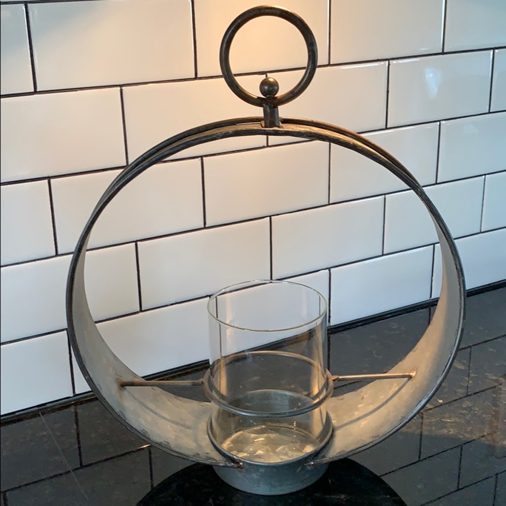 Aged metal candle holder